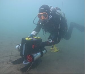 Diver with Robocean technology underwater